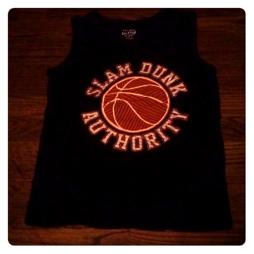 Dark blue basketball ball shirt.